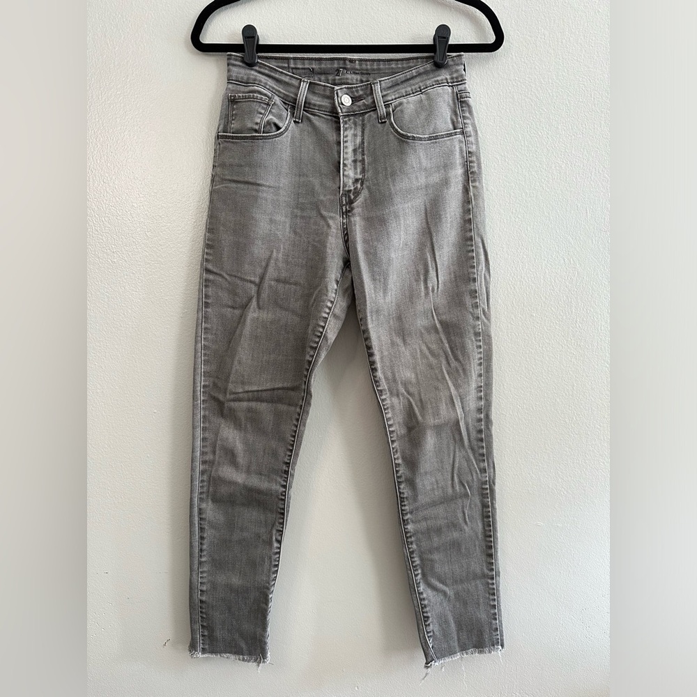 Levi’s skinny jeans, 27, frayed hem